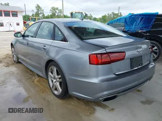 2016 Audi A6 3.0T Premium Plus with VIN WAUFGAFC1GN047352, listed as a IAAI auction lot 41934958 with 111,834 mi miles. Bid and sale history available at carsss.com. Image 3.