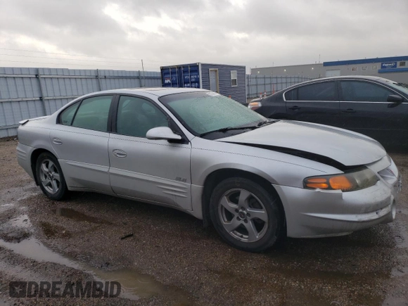 2002 Pontiac Bonneville SLE z VIN 1G2HY54KX24131828, wystawiony jako Copart lot #80754914 z przebiegiem 154 989 mil mil oraz Czysty tytuł • Clean title. Historia ofert i sprzedaży dostępna na DreamBid. Obrazek 4.