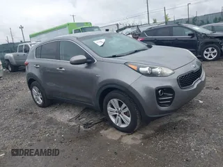 2017 Kia Sportage LX z VIN KNDPMCAC0H7103628, wystawiony jako IAAI lot #42300700 z przebiegiem 131 007 mil mil oraz . Historia ofert i sprzedaży dostępna na DreamBid. Obrazek 1.