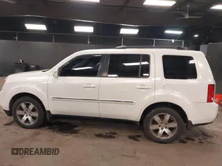 2015 Honda Pilot Touring with VIN 5FNYF4H98FB001841, listed as a IAAI auction lot 41955645 with 109,818 mi miles. Bid and sale history available at carsss.com. Image 14.