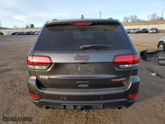 2019 Jeep Grand Cherokee Trailhawk with VIN 1C4RJFLG8KC689402, listed as a Copart auction lot 41438465 with 56,477 mi miles and Salvage Title. Bid and sale history available at carsss.com. Image 6.