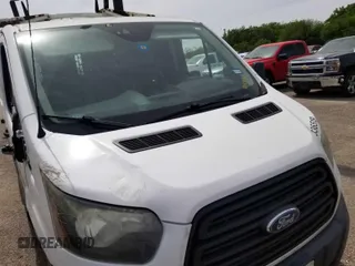 2016 Ford Transit Cargo with VIN 1FTYE1YM6GKB52123, listed as a IAAI auction lot 42168794 with 218,592 mi miles. Bid and sale history available at carsss.com. Image 9.