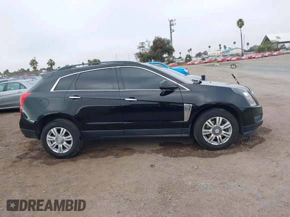 2015 Cadillac SRX with VIN 3GYFNAE37FS598023, listed as a IAAI auction lot 41198546 with 127,373 mi miles and . Bid and sale history available at carsss.com. Image 13.