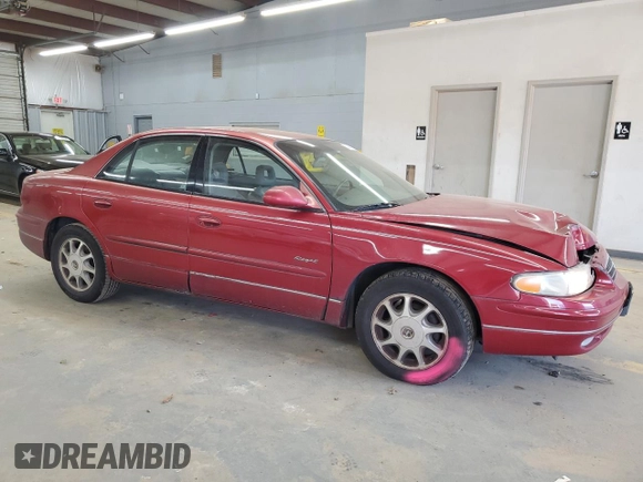 1999 Buick Regal LS with VIN 2G4WB52K0X1589416, listed as a Copart auction lot 82967924 with 0 mi miles and Salvage Title. Bid and sale history available at carsss.com. Image 4.