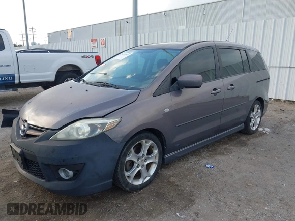 2009 Mazda 5 Sport with VIN JM1CR29L990341261, listed as a IAAI auction lot 41522567 with 123,465 mi miles and . Bid and sale history available at DreamBid. Image 2.