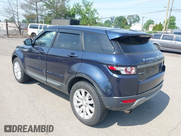 2015 Land Rover Range Rover Evoque Pure z VIN SALVN2BG5FH972645, wystawiony jako IAAI lot #42482661 z przebiegiem 156 726 mil mil oraz . Historia ofert i sprzedaży dostępna na DreamBid. Obrazek 3.