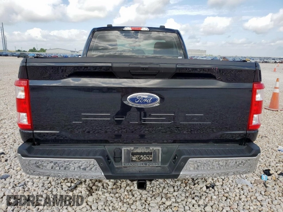 2022 Ford F-150 XL with VIN 1FTMF1C59NKF26135, listed as a Copart auction lot 60034745 with 57,430 mi miles and Salvage title. Bid and sale history available at DreamBid. Image 6.