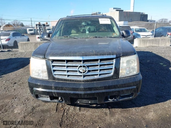 2006 Cadillac Escalade with VIN 1GYEK63NX6R110465, listed as a IAAI auction lot 41268338 with 202,042 mi miles. Bid and sale history available at carsss.com. Image 6.
