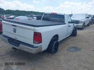 2014 Ram 1500 Tradesman with VIN 3C6JR6DT4EG186606, listed as a IAAI auction lot 42640415 with 113,110 mi miles and . Bid and sale history available at DreamBid. Image 4.