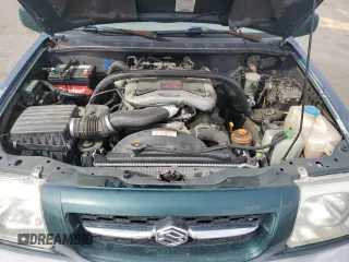 1999 Suzuki Grand Vitara JLX z VIN JS3TD62V0X4124366, wystawiony jako Copart lot #50885055 z przebiegiem 204 168 mil mil oraz Szkoda całkowita • Salvage title. Historia ofert i sprzedaży dostępna na DreamBid. Obrazek 11.
