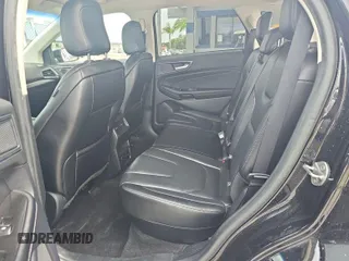 2020 Ford Edge Titanium z VIN 2FMPK3K91LBA60874, wystawiony jako IAAI lot #42470865 z przebiegiem 94 048 mil mil oraz . Historia ofert i sprzedaży dostępna na DreamBid. Obrazek 4.