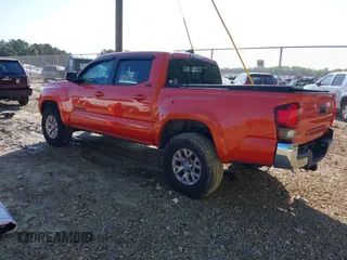 2018 Toyota Tacoma SR5 with VIN 5TFAZ5CN2JX069067, listed as a IAAI auction lot 41975459 with 92,434 mi miles and . Bid and sale history available at DreamBid. Image 3.