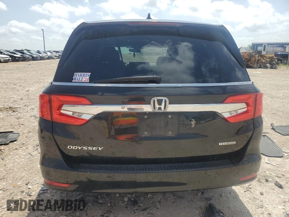 2018 Honda Odyssey Touring с VIN 5FNRL6H84JB021464, выставлен на аукционе Copart как лот 54152615 с пробегом 77 400 миль миль и Списание • Salvage title. История ставок и продаж доступна на DreamBid. Изображение 6.