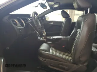 2010 Ford Mustang GT500 with VIN 1ZVBP8JSXA5160889, listed as a Copart auction lot 69408854 with 64,588 mi miles and Salvage title. Bid and sale history available at DreamBid. Image 7.