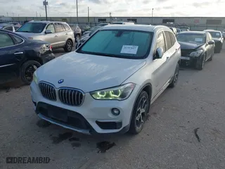 2016 BMW X1 xDrive28i with VIN WBXHT3C3XGP889461, listed as a IAAI auction lot 41757627 with 105,681 mi miles. Bid and sale history available at carsss.com. Image 17.