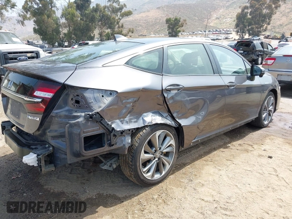 2018 Honda Clarity with VIN JHMZC5F12JC013732, listed as a IAAI auction lot 42157758 with 162,470 mi miles. Bid and sale history available at carsss.com. Image 4.