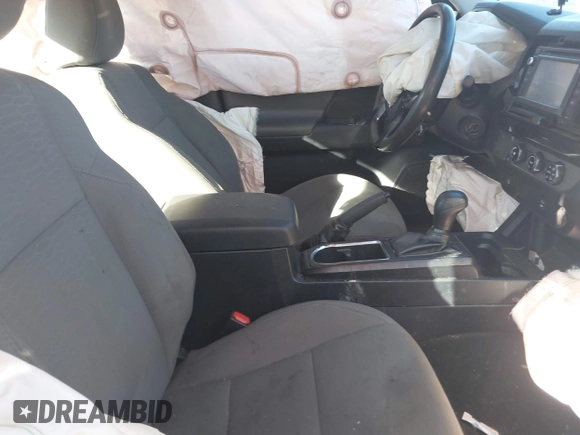 2018 Toyota Tacoma SR with VIN 5TFRX5GN9JX121099, listed as a IAAI auction lot 41186232 with 127,151 mi miles and . Bid and sale history available at DreamBid. Image 5.