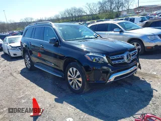 2019 Mercedes-Benz GLS with VIN 4JGDF6EE2KB210870, listed as a IAAI auction lot 41815048 with 66,970 mi miles. Bid and sale history available at carsss.com. Image 1.