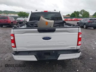 2023 Ford F-150 XL with VIN 1FTEW1EP5PFB87582, listed as a IAAI auction lot 42254015 with 10,476 mi miles and . Bid and sale history available at DreamBid. Image 16.