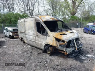 2015 Ford Transit Cargo z VIN 1FTNR2CG5FKA99184, wystawiony jako IAAI lot #42143175 z przebiegiem Nie podano mil oraz . Historia ofert i sprzedaży dostępna na DreamBid. Obrazek 1.