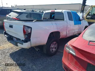 2019 Toyota Tacoma SR with VIN 5TFRX5GN9KX140351, listed as a IAAI auction lot 42593591 with 202,707 mi miles and . Bid and sale history available at DreamBid. Image 4.