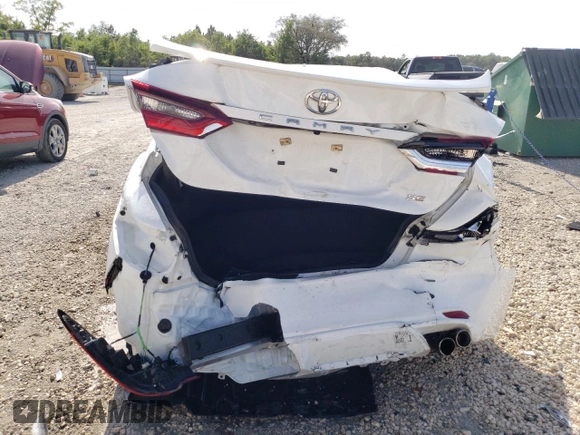 2023 Toyota Camry SE with VIN 4T1G11AKXPU837029, listed as a Copart auction lot 54522985 with 32,984 mi miles and Salvage Title. Bid and sale history available at DreamBid. Image 6.