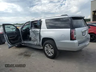 2020 GMC Yukon XL Denali with VIN 1GKS2HKJ4LR201038, listed as a Copart auction lot 66917904 with 99,944 mi miles and Salvage Title. Bid and sale history available at carsss.com. Image 2.