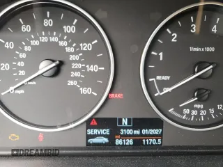 2014 BMW 3 Series 320i xDrive with VIN WBA3C3G50ENS67198, listed as a Copart auction lot 61654205 with 86,126 mi miles and Salvage title. Bid and sale history available at DreamBid. Image 9.