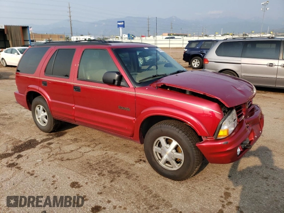 2000 Oldsmobile Bravada z VIN 1GHDT13W6Y2308007, wystawiony jako Copart lot #63862394 z przebiegiem 142 617 mil mil oraz Szkody całkowita. Historia ofert i sprzedaży dostępna na DreamBid. Obrazek 4.