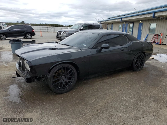 2013 Dodge Challenger R/T with VIN 2C3CDYBT9DH558815, listed as a Copart auction lot 47601315 with 124,098 mi miles and Salvage Title. Bid and sale history available at carsss.com. Image 1.