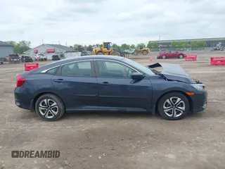 2017 Honda Civic LX z VIN 2HGFC2F54HH567210, wystawiony jako IAAI lot #42254401 z przebiegiem 30 126 mil mil oraz . Historia ofert i sprzedaży dostępna na DreamBid. Obrazek 13.