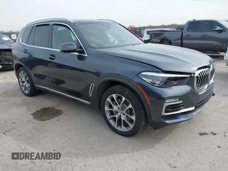 2019 BMW X5 xDrive40i with VIN 5UXCR6C59KLL08488, listed as a IAAI auction lot 41724824 with 57,334 mi miles. Bid and sale history available at carsss.com. Image 1.