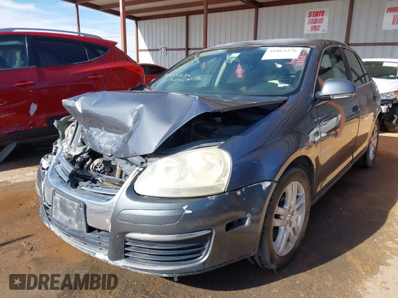 2007 Volkswagen Jetta 2.5 z VIN 3VWRF71K37M101410, wystawiony jako IAAI lot #41863276 z przebiegiem 195 616 mil mil oraz . Historia ofert i sprzedaży dostępna na DreamBid. Obrazek 6.