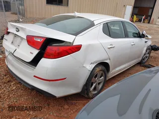 2015 Kia Optima LX with VIN KNAGM4A73F5646213, listed as a IAAI auction lot 41290553 with 101,415 mi miles. Bid and sale history available at carsss.com. Image 4.