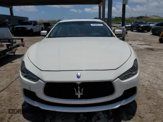 2014 Maserati Ghibli S Q4 z VIN ZAM57RTA1E1126438, wystawiony jako Copart lot #58388215 z przebiegiem 95 167 mil mil oraz Tytuł czysty. Historia ofert i sprzedaży dostępna na DreamBid. Obrazek 5.