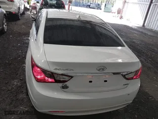2013 Hyundai Sonata SE with VIN 5NPEC4AC0DH599584, listed as a IAAI auction lot 41961659 with 122,296 mi miles. Bid and sale history available at carsss.com. Image 16.