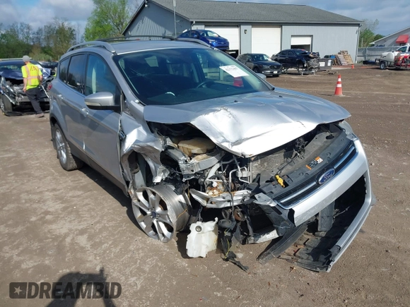 2015 Ford Escape Titanium z VIN 1FMCU9J99FUC75852, wystawiony jako IAAI lot #42171467 z przebiegiem 113 322 mil mil oraz . Historia ofert i sprzedaży dostępna na DreamBid. Obrazek 1.