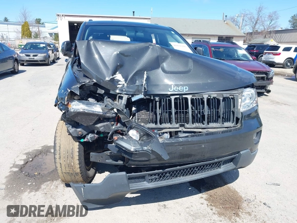 2011 Jeep Grand Cherokee Laredo z VIN 1J4RR4GG9BC519132, wystawiony jako IAAI lot #41931266 z przebiegiem 118 534 mil mil oraz . Historia ofert i sprzedaży dostępna na DreamBid. Obrazek 6.