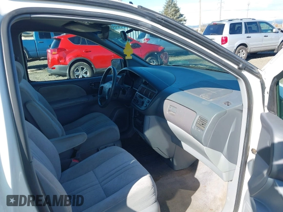 2000 Toyota Sienna CE with VIN 4T3ZF19C3YU189677, listed as a IAAI auction lot 41803833 with 201,661 mi miles. Bid and sale history available at carsss.com. Image 5.