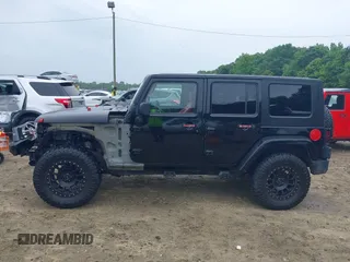 2008 Jeep Wrangler Unlimited Sahara with VIN 1J4GA59128L504798, listed as a IAAI auction lot 42210839 with 162,406 mi miles and . Bid and sale history available at DreamBid. Image 15.