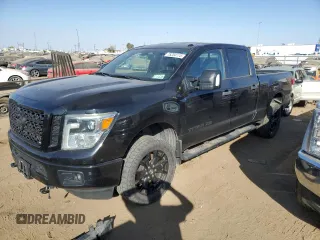 2018 Nissan Titan XD PRO-4X with VIN 1N6BA1F40JN542870, listed as a Copart auction lot 75204174 with 115,603 mi miles and Salvage Title. Bid and sale history available at carsss.com. Image 1.