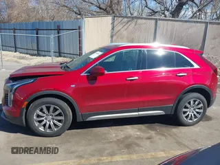 2019 Cadillac XT4 AWD Premium Luxury с VIN 1GYFZDR44KF133013, выставлен на аукционе IAAI как лот 41868561 с пробегом 96 956 миль миль и . История ставок и продаж доступна на DreamBid. Изображение 14.