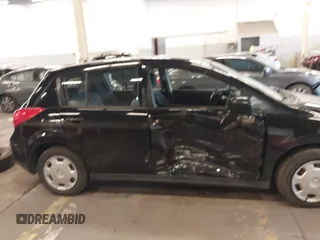 2009 Nissan Versa 1.8 S with VIN 3N1BC13E39L415491, listed as a IAAI auction lot 41614914 with 104,795 mi miles. Bid and sale history available at carsss.com. Image 13.