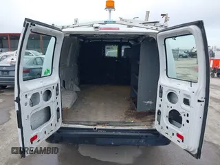 2009 Ford Econoline Cargo Commercial with VIN 1FTNE14W49DA93428, listed as a IAAI auction lot 41641859 with 220,630 mi miles and . Bid and sale history available at DreamBid. Image 17.