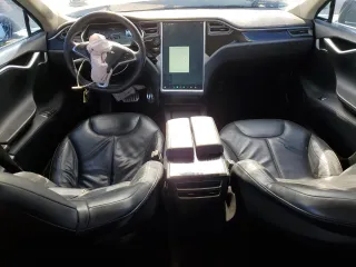 2014 Tesla Model S 60 with VIN 5YJSA1H13EFP38425, listed as a Copart auction lot 63686205 with 183,968 mi miles and Salvage title. Bid and sale history available at DreamBid. Image 8.