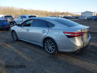 2014 Toyota Avalon Limited with VIN 4T1BK1EB4EU090185, listed as a IAAI auction lot 41715194 with 120,489 mi miles and . Bid and sale history available at carsss.com. Image 3.