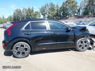 2023 Kia Niro SX Touring with VIN KNDCT3LE6P5038102, listed as a IAAI auction lot 41710555 with 57,669 mi miles. Bid and sale history available at carsss.com. Image 13.