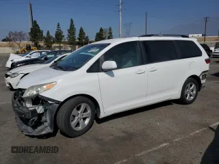 2015 Toyota Sienna LE AAS with VIN 5TDKK3DC0FS621074, listed as a Copart auction lot 53922885 with 121,018 mi miles and Salvage title. Bid and sale history available at DreamBid. Image 1.