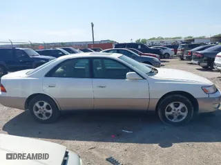 1997 Lexus ES 300 Luxury Sport Sdn with VIN JT8BF22G6V0014374, listed as a IAAI auction lot 41902456 with 118,964 mi miles. Bid and sale history available at carsss.com. Image 14.