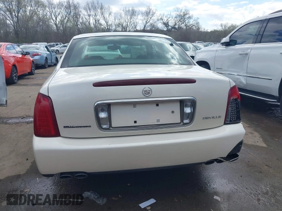 2003 Cadillac DeVille z VIN 1G6KD54Y13U208351, wystawiony jako IAAI lot #41889713 z przebiegiem 132 774 mil mil oraz . Historia ofert i sprzedaży dostępna na DreamBid. Obrazek 17.